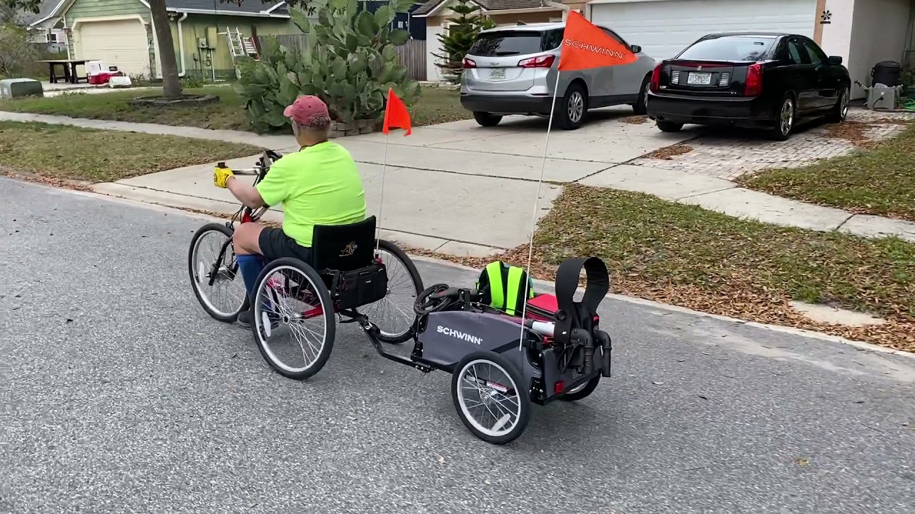 Top End Excelerator handcycle and Schwinn Daytripper cargo trailer