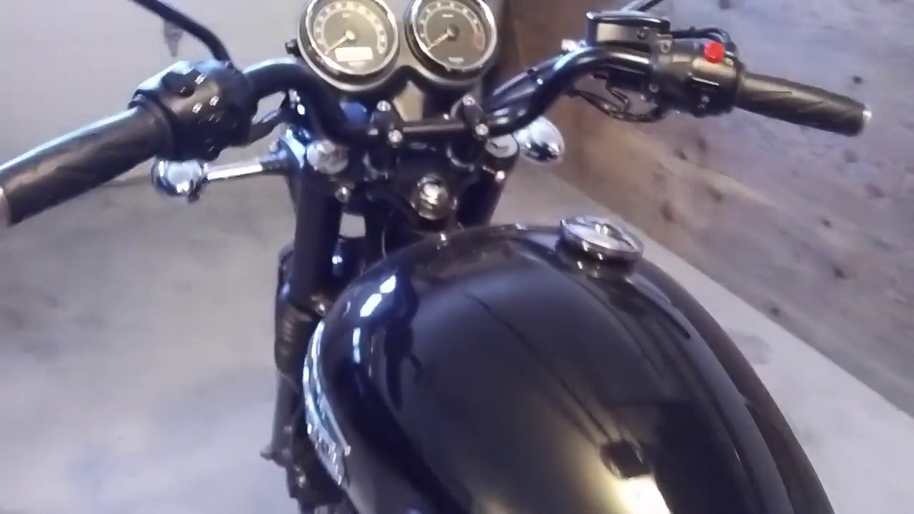Triumph Bonneville stock exhaust vs British Customs Sleeper pro