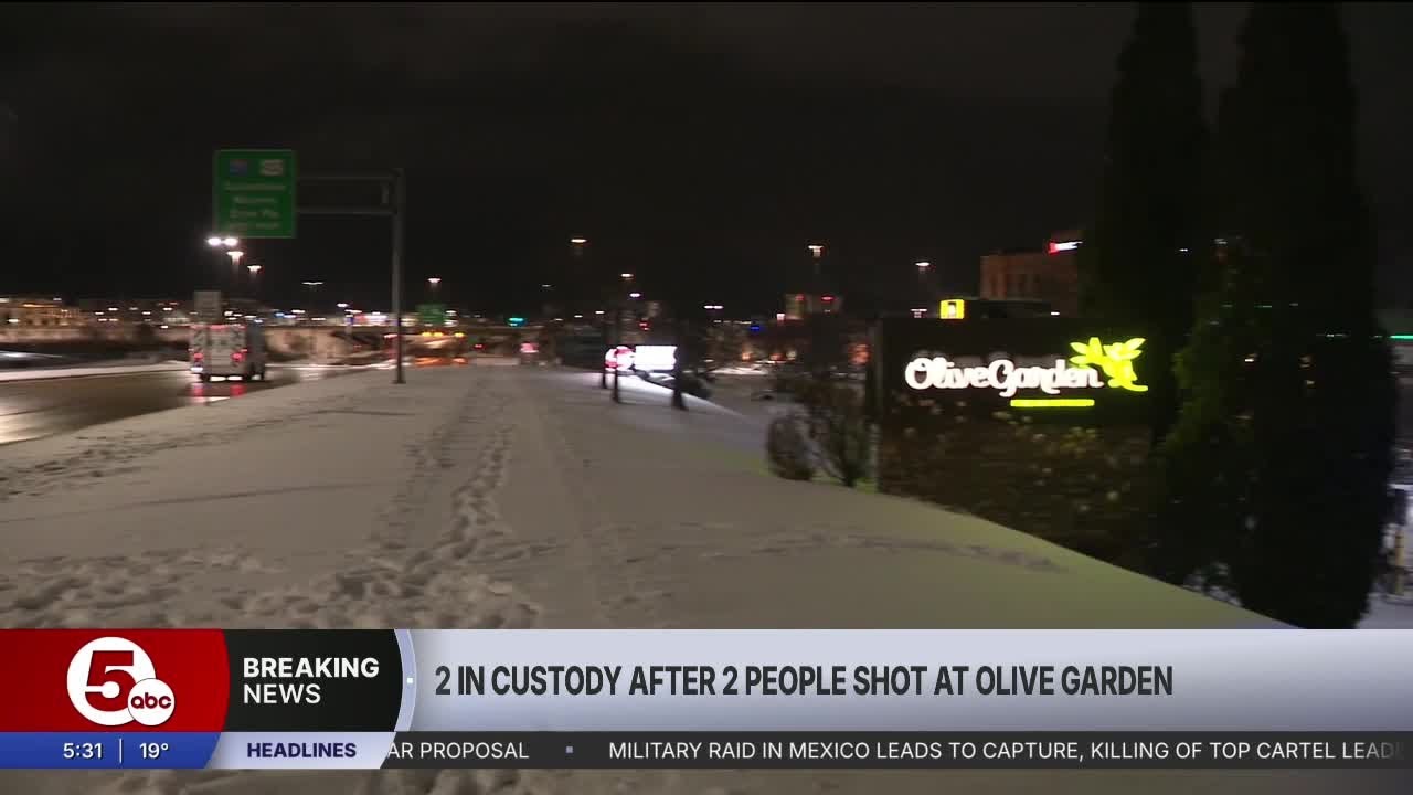 2 people in custody after Olive Garden shooting