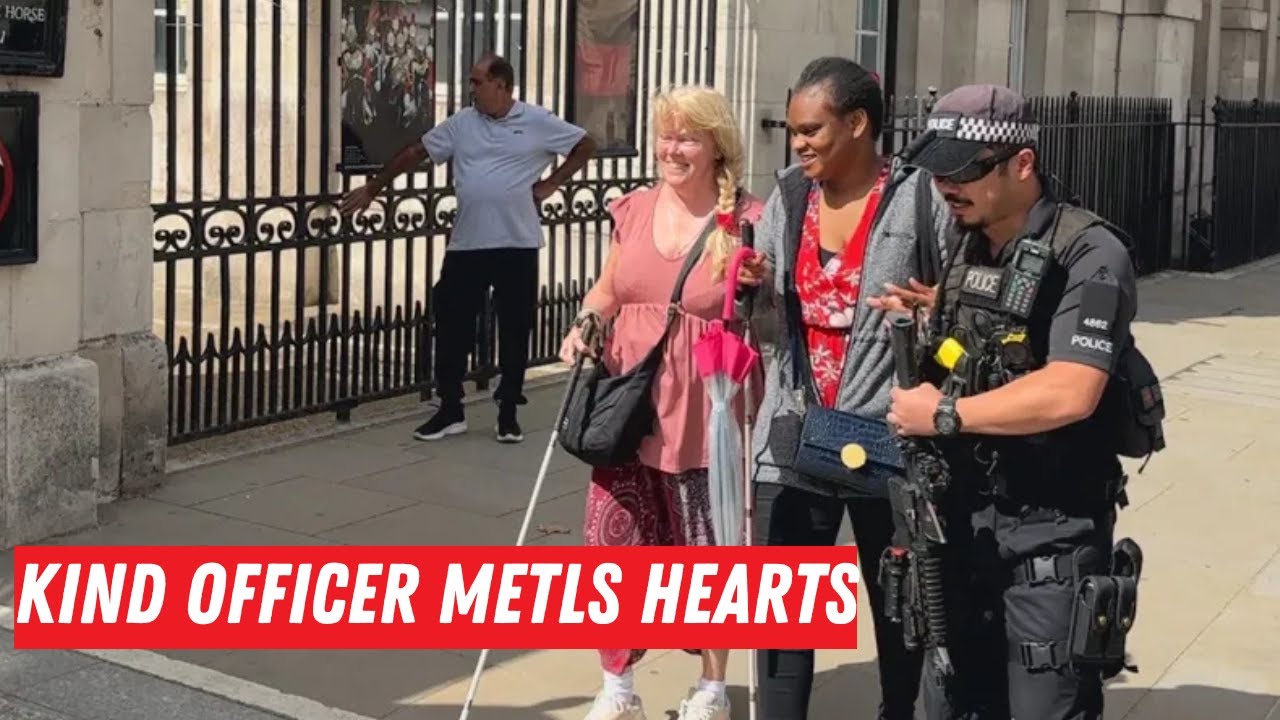 Kind Officer Helps Ladies Pass Safely Through the Horses