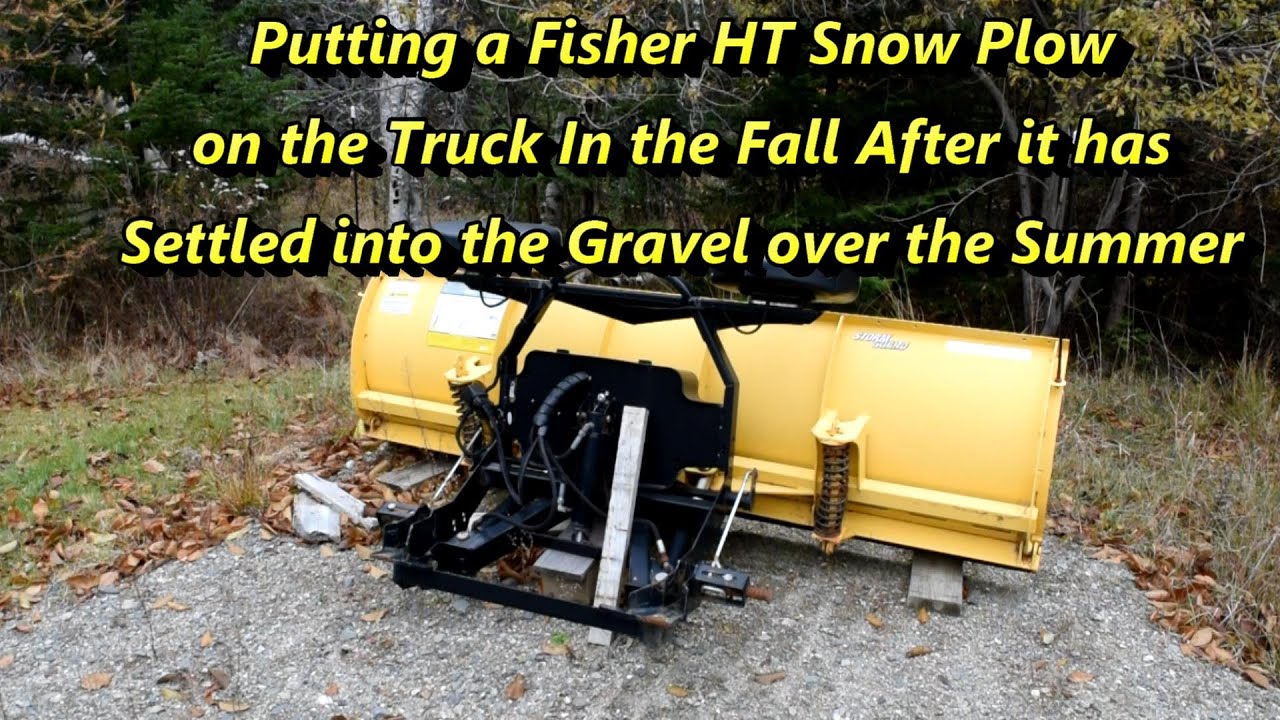 Putting a Fisher HT Snowplow on the Truck after it has had the Summer to Settle into the Gravel
