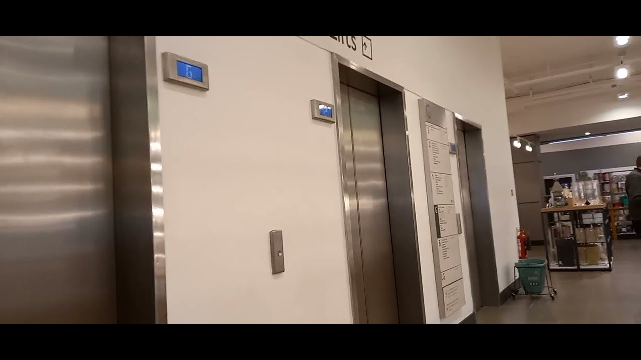 NICE SLAM!! (2005) Otis ModLogic lifts at John Lewis in Reading