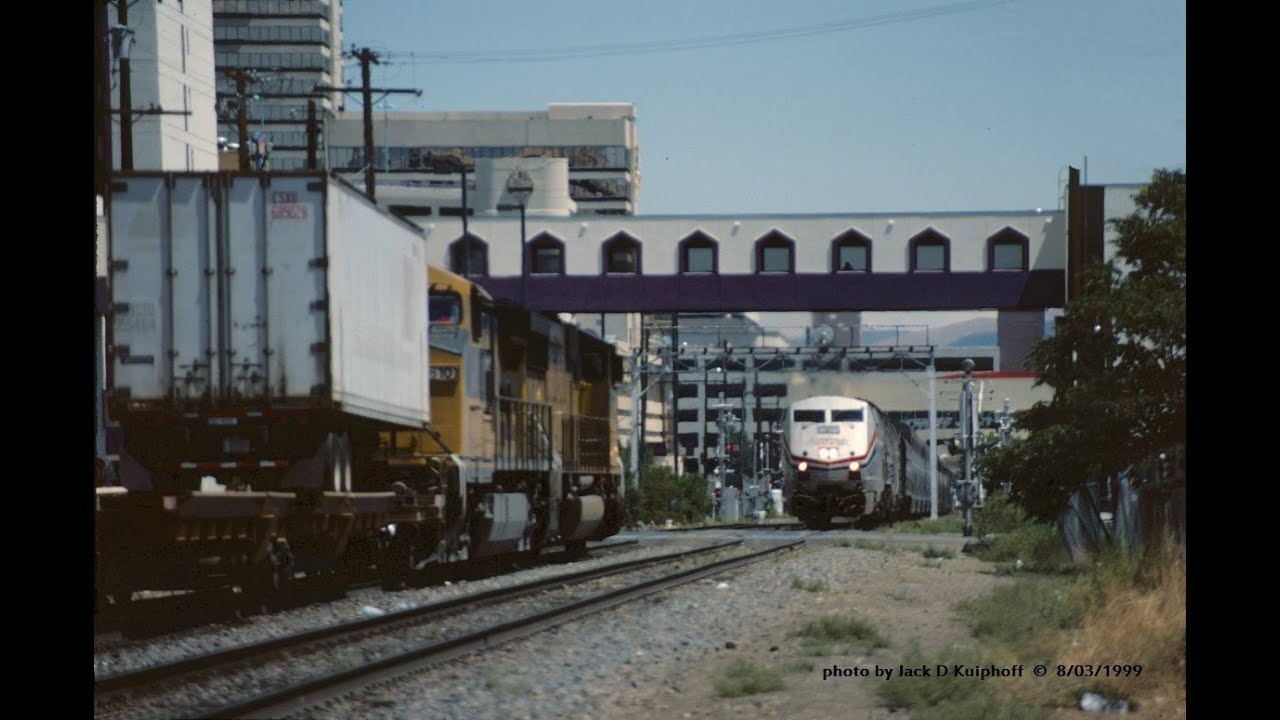 Amtrak's California Zephyr,  #5 passes UP trailer train at street level in Reno, NV