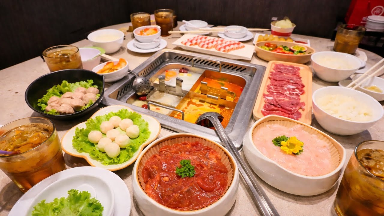 4-in-1 Chinese Hot Pot with a Crazy Noodle Dance Show!