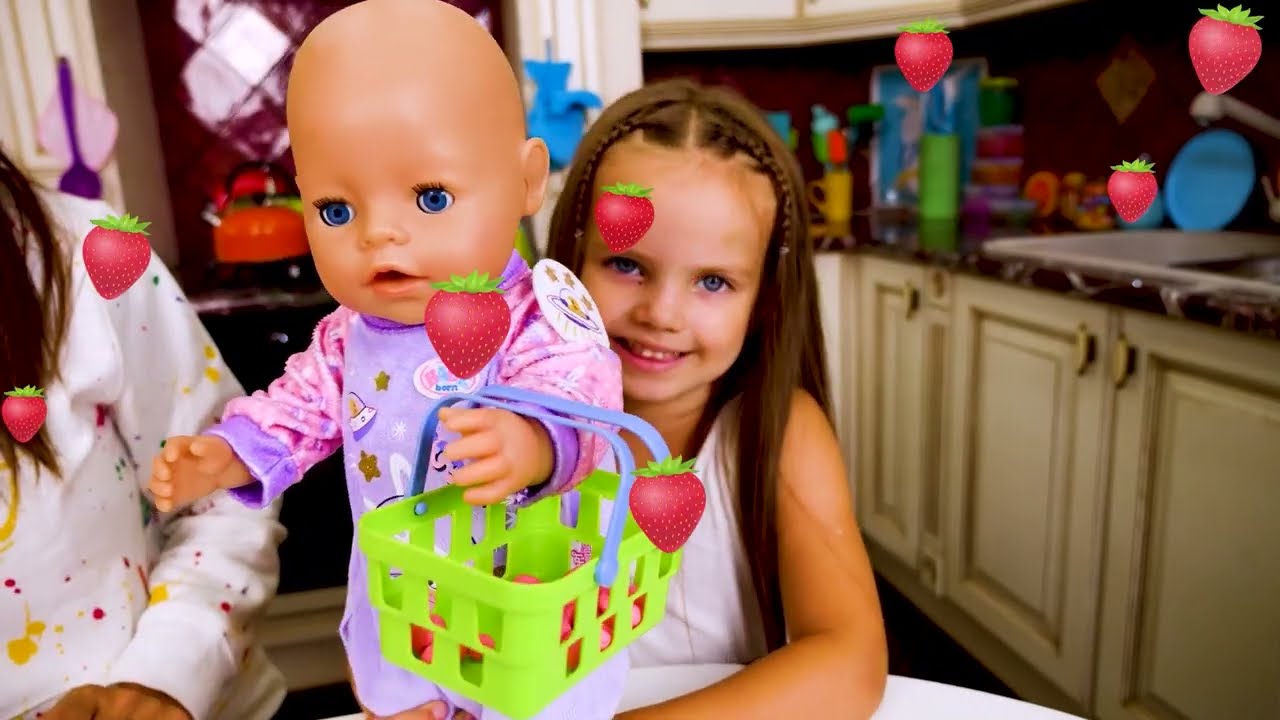 Maya prépare une tarte aux baies pour sa poupée Bébé Born Lina. Jeux pour enfants