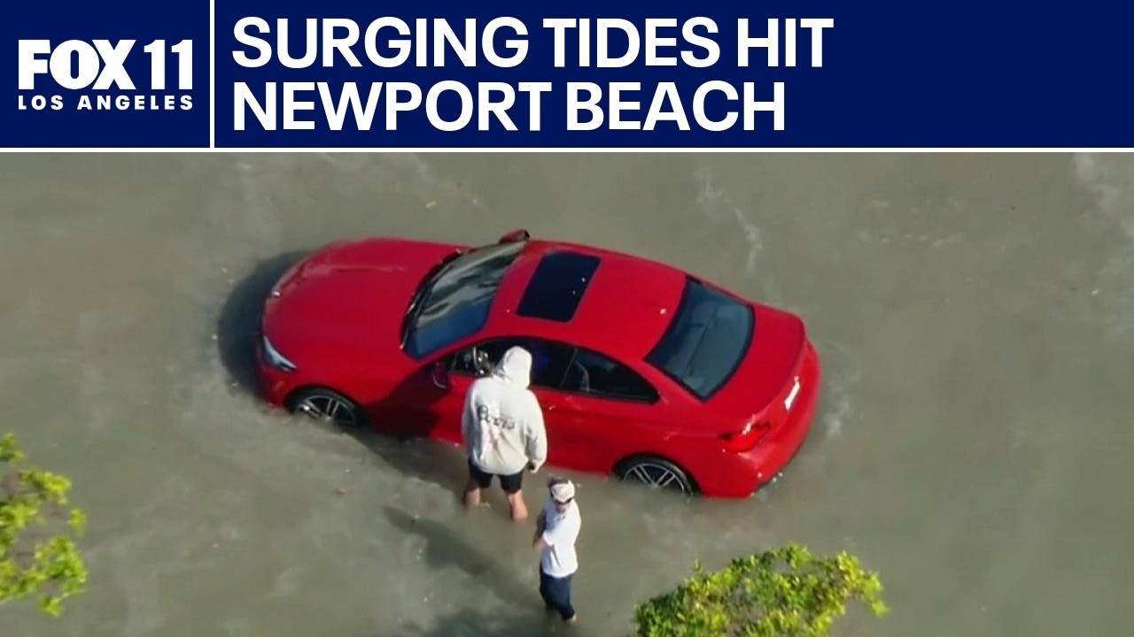 High tide floods streets of Newport Beach