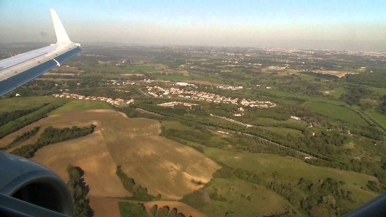 Approach and landing at Rome Fiumicino (Alitalia Express Embraer 175)