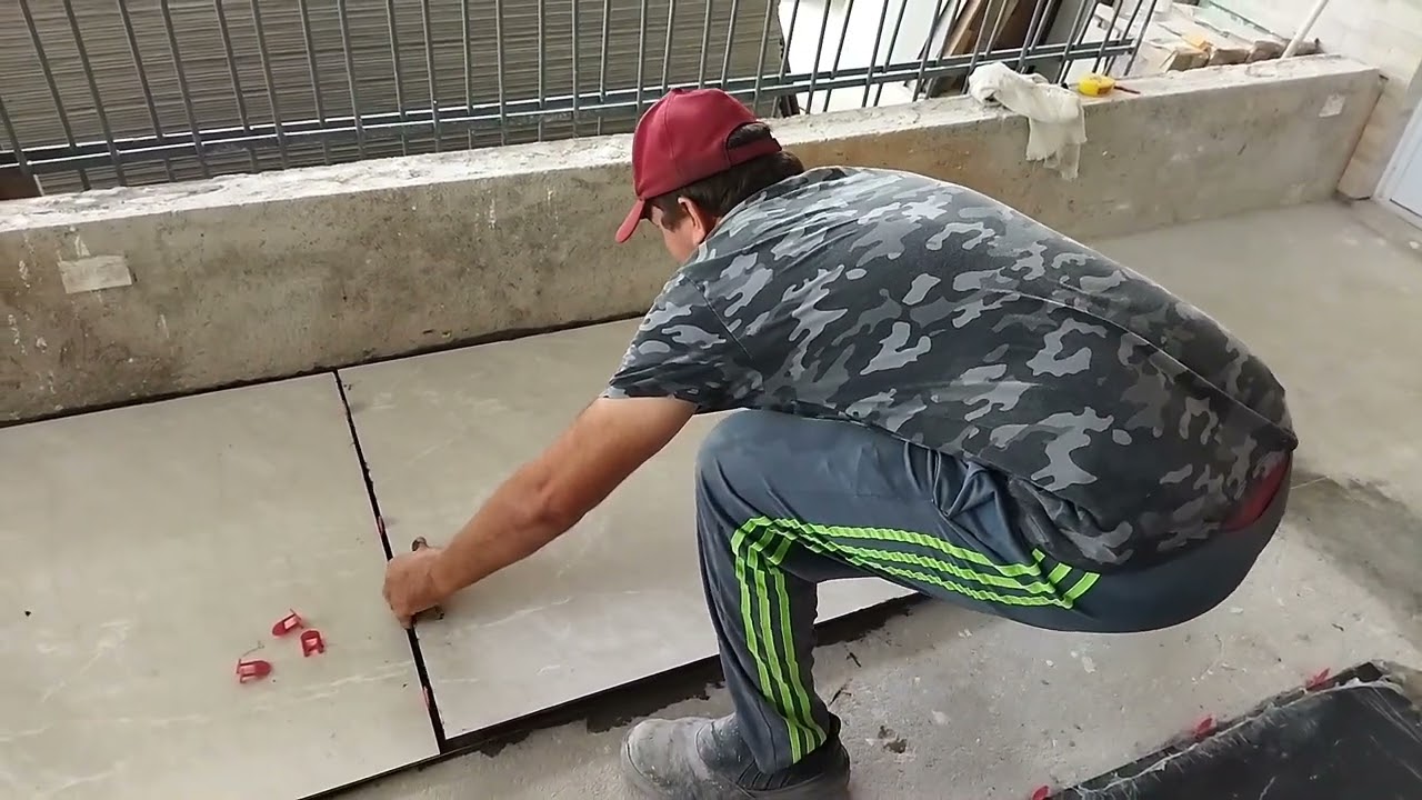assentando porcelanato 90x90