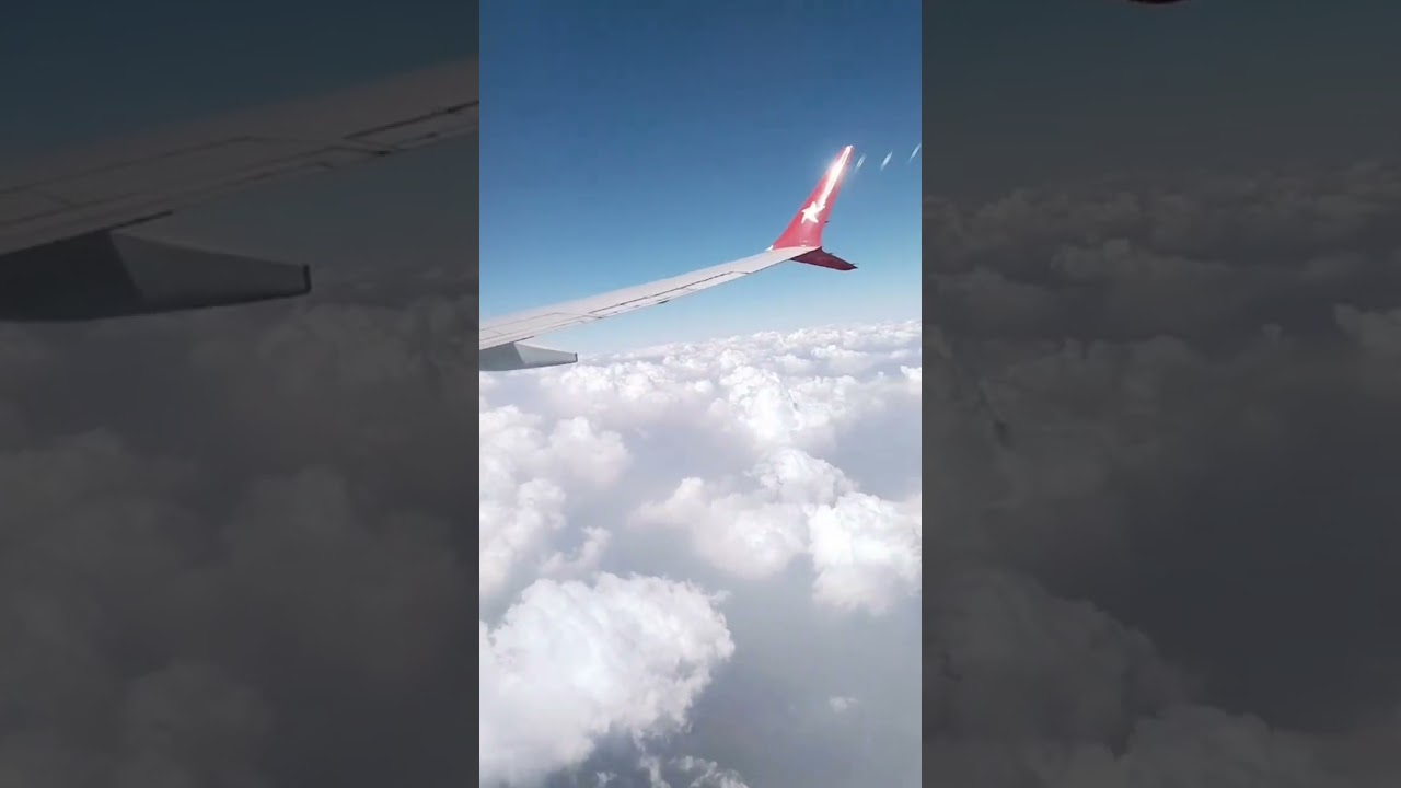 flight window seat views of cloud 