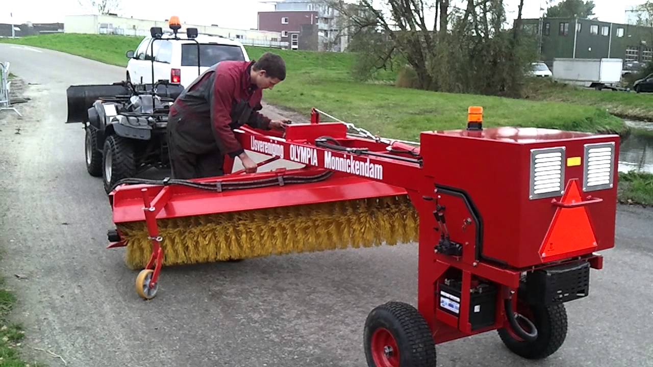 Sneeuwborstel 2.75m achter Yamaha Grizzly 700 IJsvereniging Olympia  -in werking