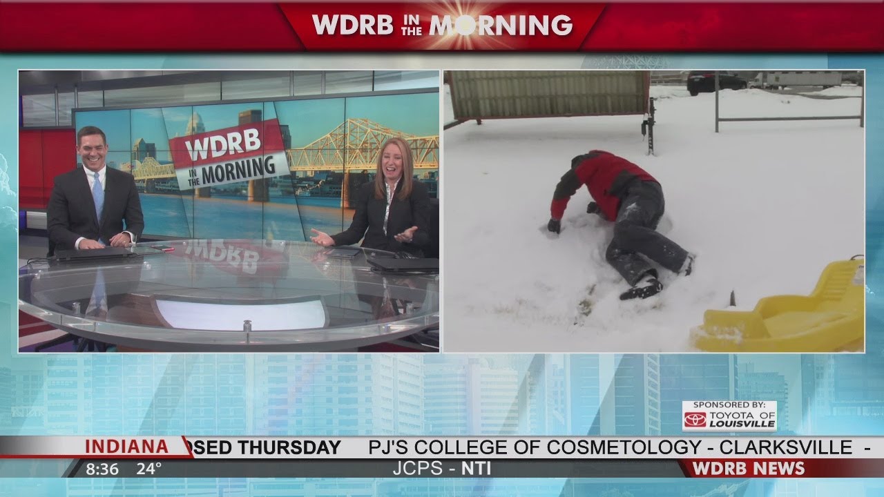 Keith Kaiser wipes out trying to pull the WDRB Mobile Snow Unit