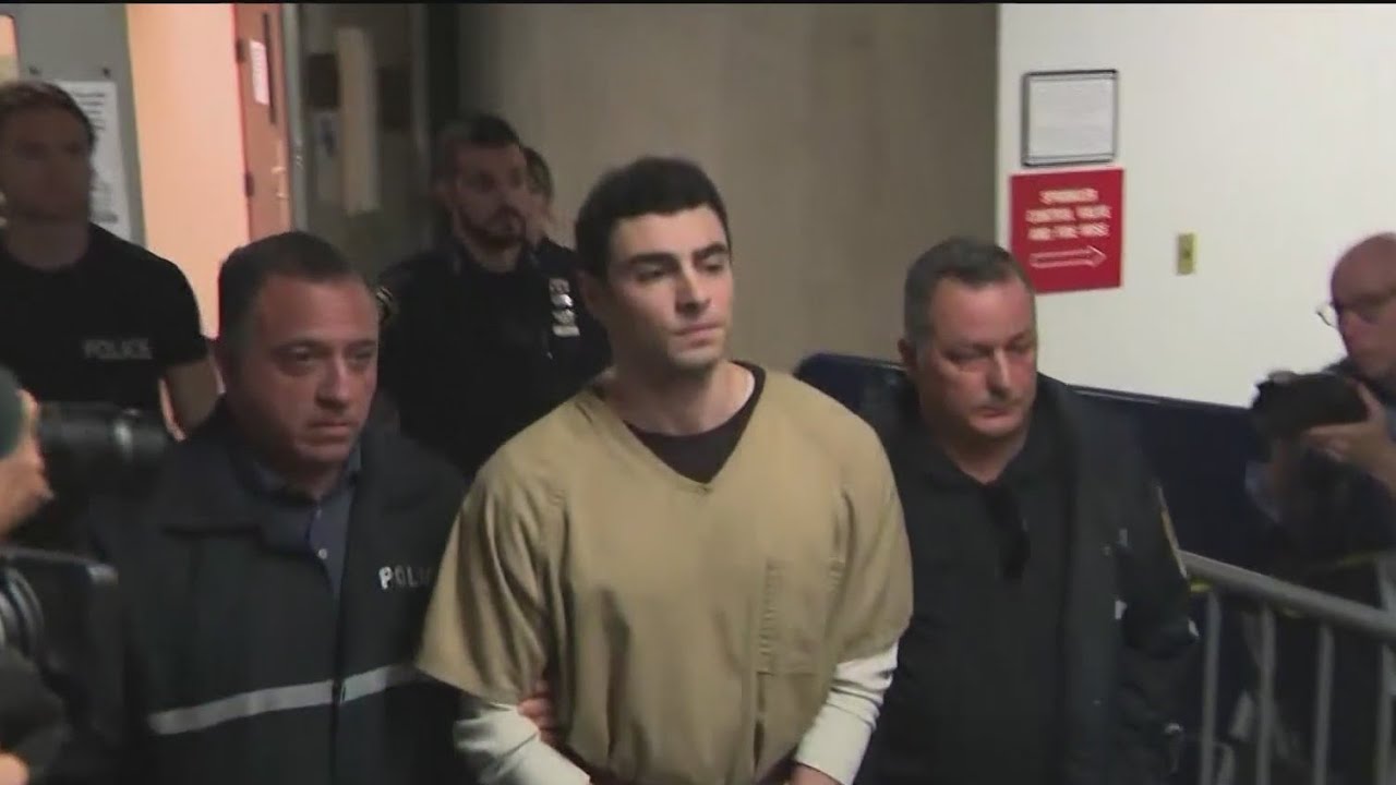 Luigi Mangione supporters cheer as some of his charges are dropped