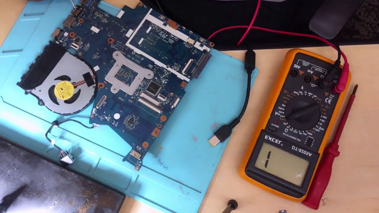 Steps to diagnose the Lenovo ideapad 300-15isk not turning on due to a short on the board