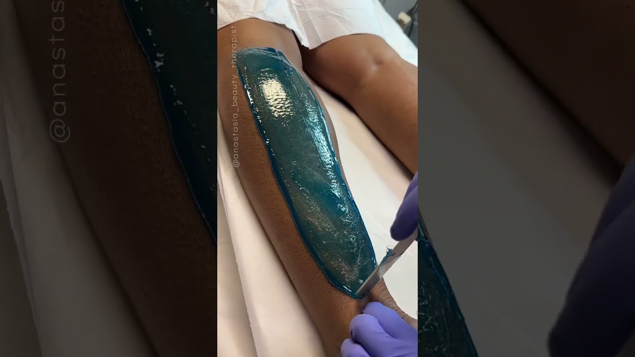 Lower leg wax service using blue hard wax formula from Starpil