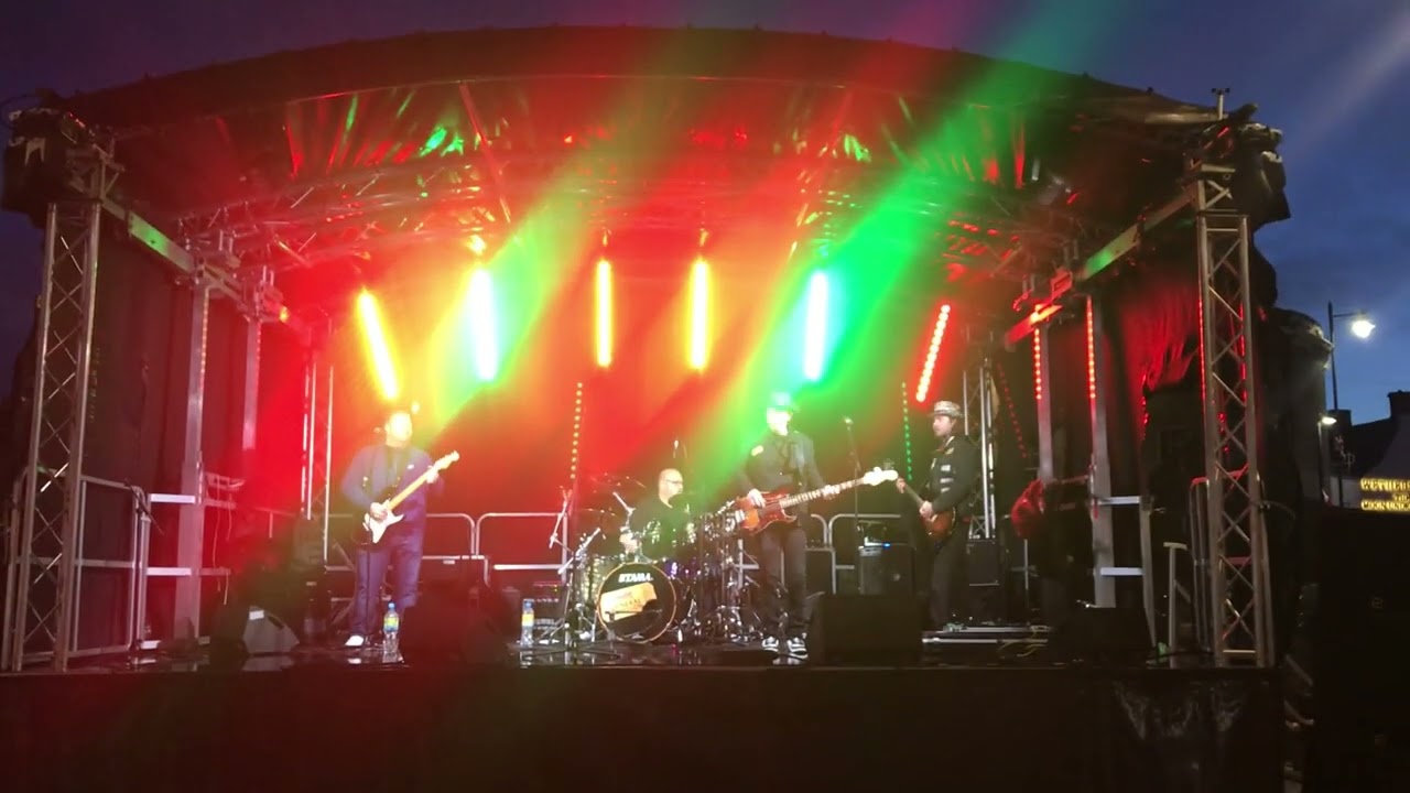 A live group playing 'Last Christmas' in 2025