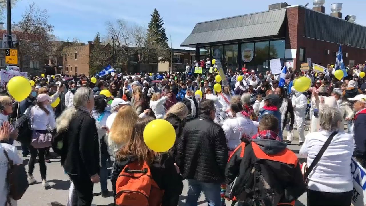Protesters rally in Montreal against health restrictions | AFP