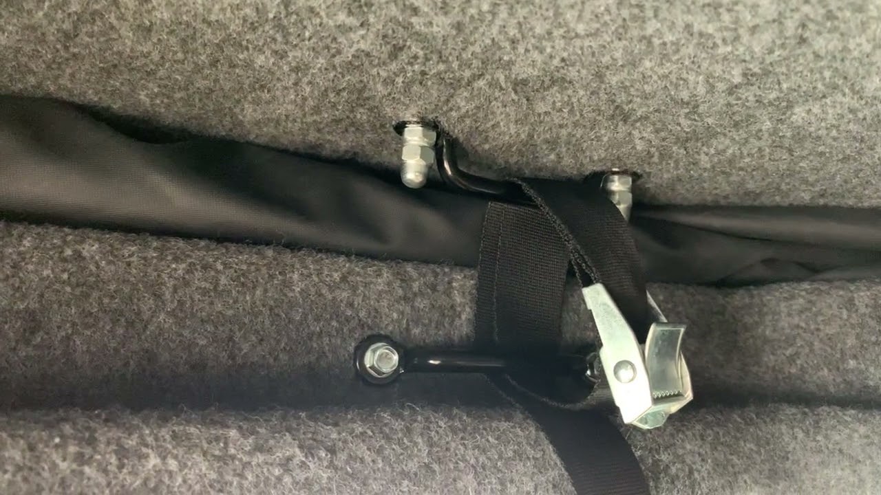 Pop top strap fastening