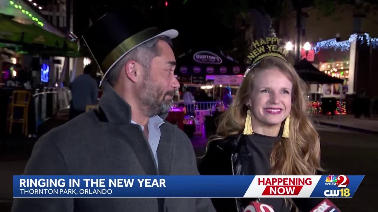 People celebrate New Year's Eve in downtown Orlando