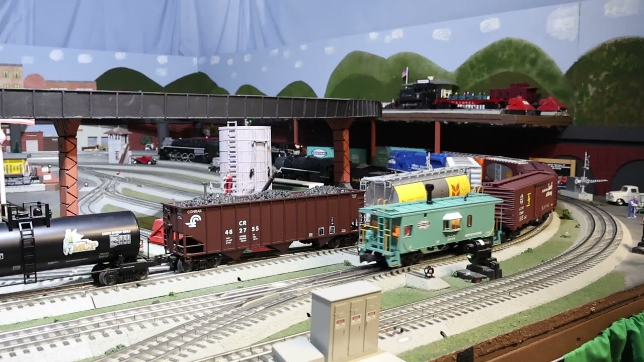 Video- 186 - Fun Switching Locomotives and putting box cars on the track sidings.