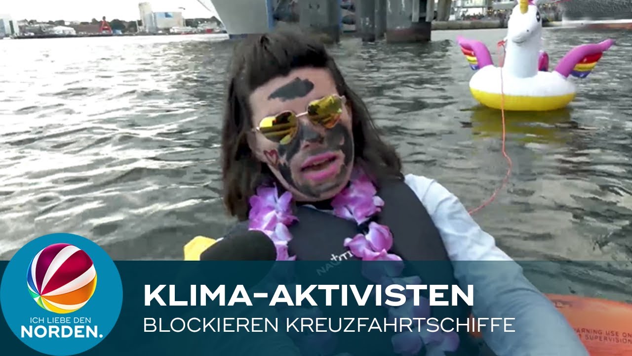 Klima-Aktivisten blockieren Kreuzfahrtschiffe im Hafen von Kiel