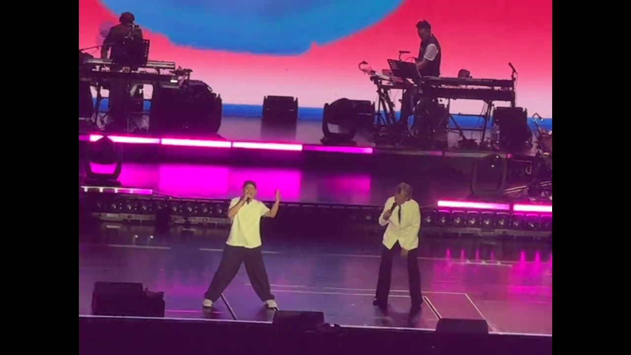 Justin Lo performing with Sally Yeh and George Lam, We Are One in Kuala Lumpur 2026