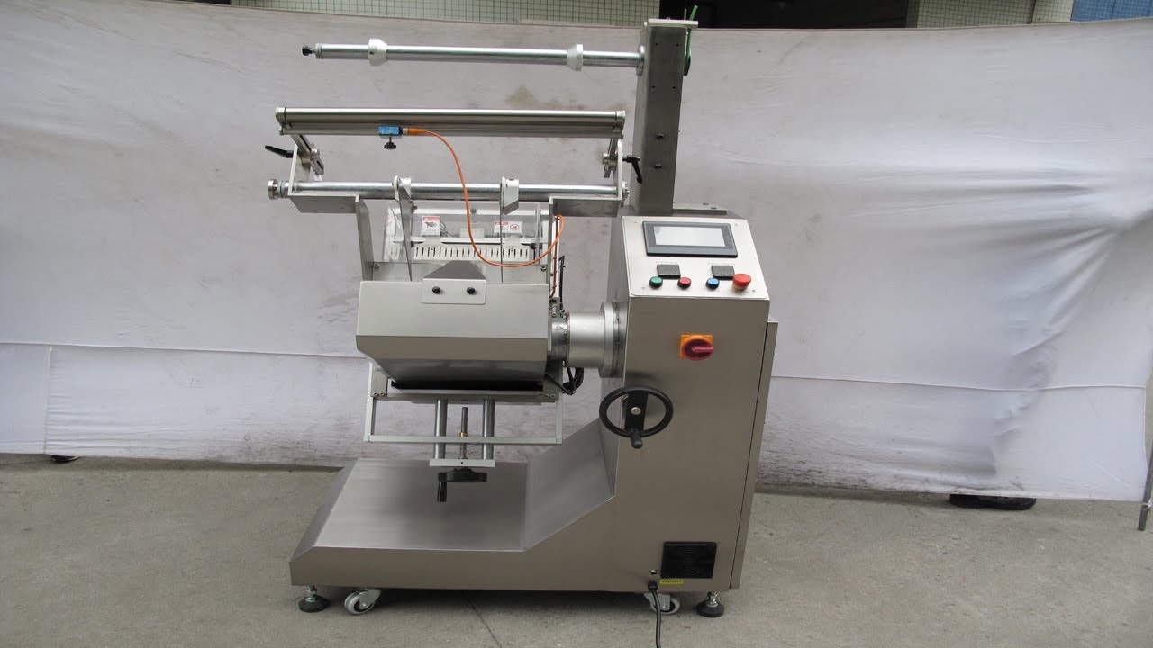 Simple type flow wrap packing machine vertical feeder film wrapper tilted machinery