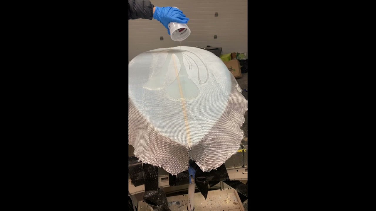 Glassing The Bottom Of A Skimboard Made From Scrap Foam