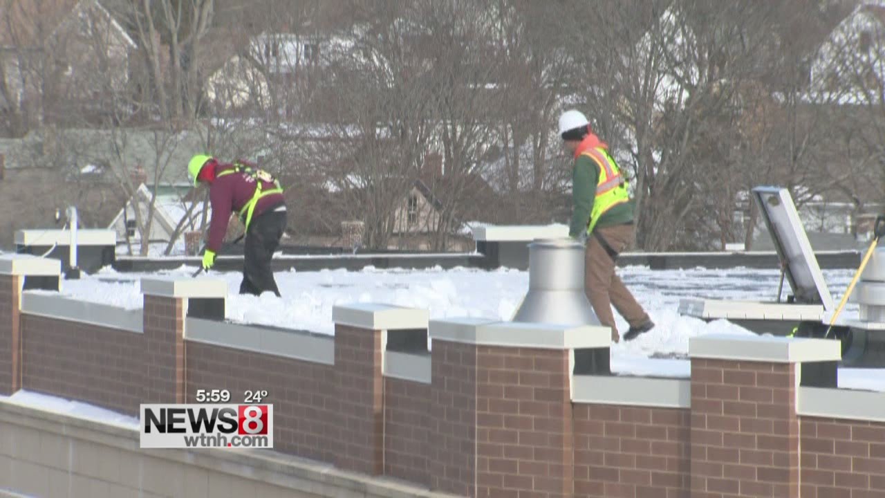 Snow removal can prevent roof collapse