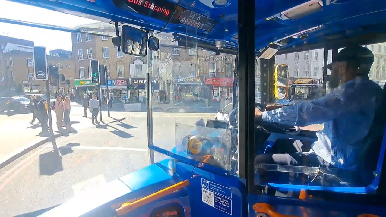 Getting on My Uncles E400H Euro 6 Stagecoach 12310 SN14TYG Route 205 at Kings Cross, Caledonian Road