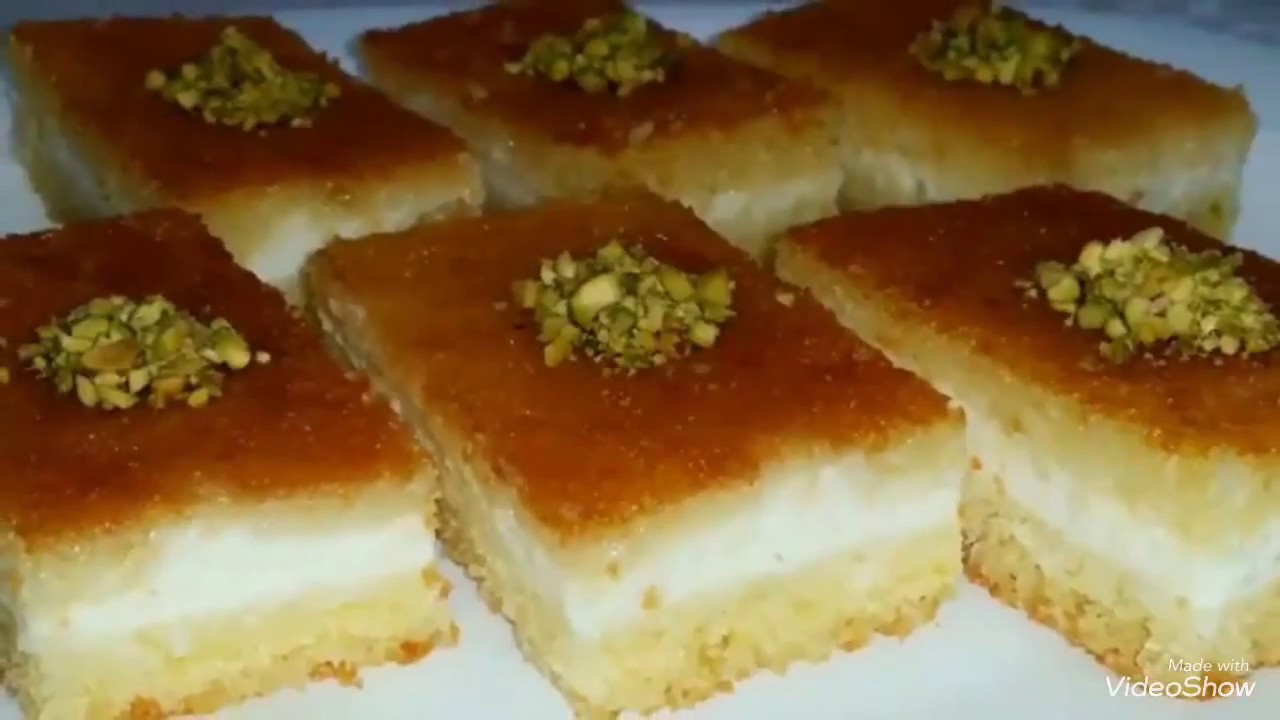 بسبوسة محشية بالقشطة بـ ( طعم رائع )