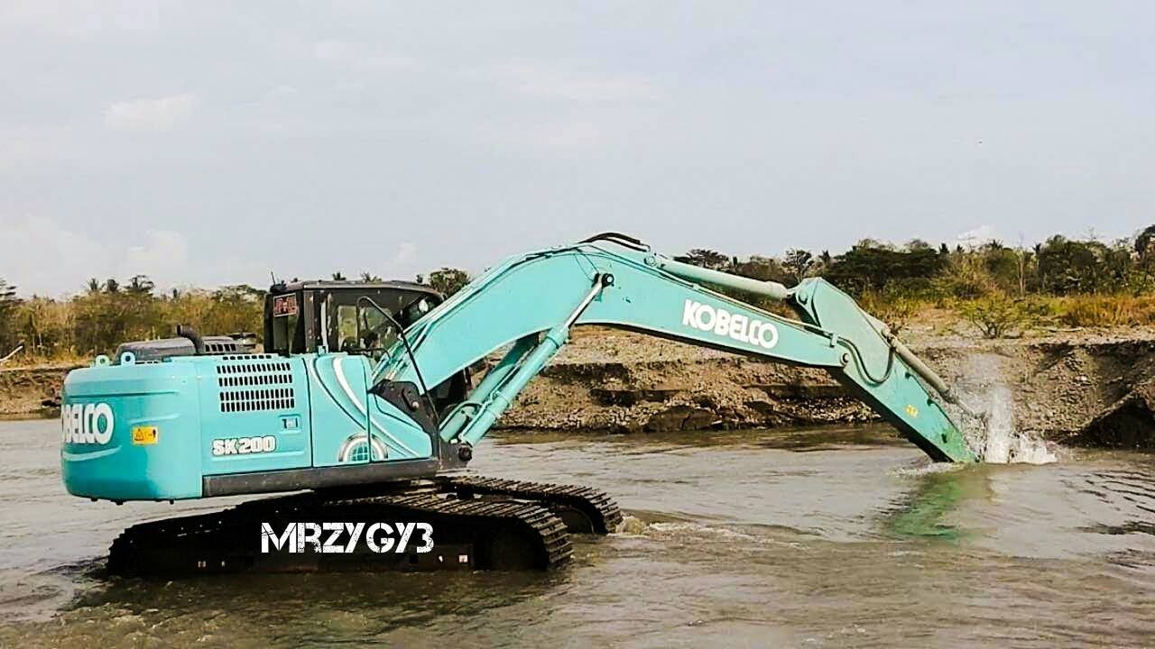 Kobelco SK200-10 Excavator Loading Dump Truck