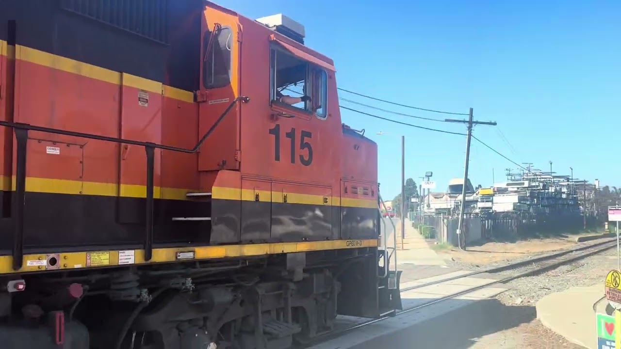 BNSF 115 leads the 748 Job to the Alcoa Yard and El Segundo Yard after passing Sepulveda Blvd 