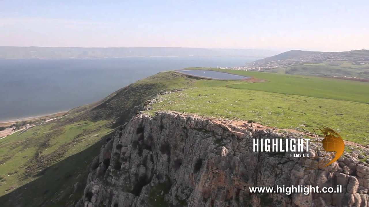 AN 001E Israel aerial footage: Aerial video of Arbel Cliff in spring, with Sea of Galilee