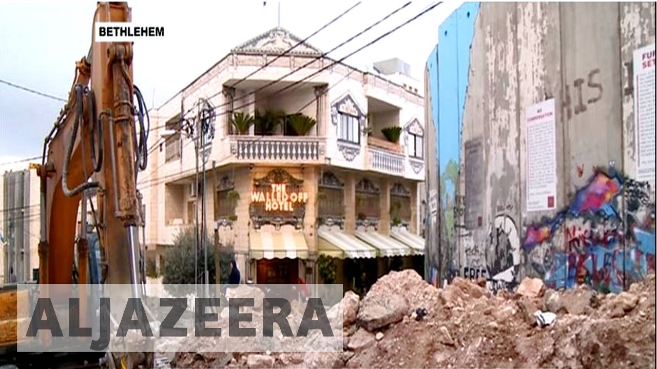 Banksy opens Walled Off Hotel in Bethlehem