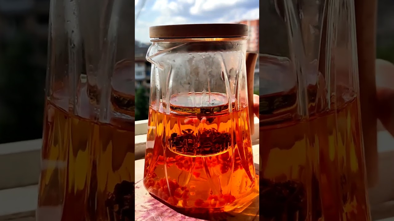 Black tea with a mint leaf and raspberries. A piece of raspberry is heart-shaped🥰 #tea #chill