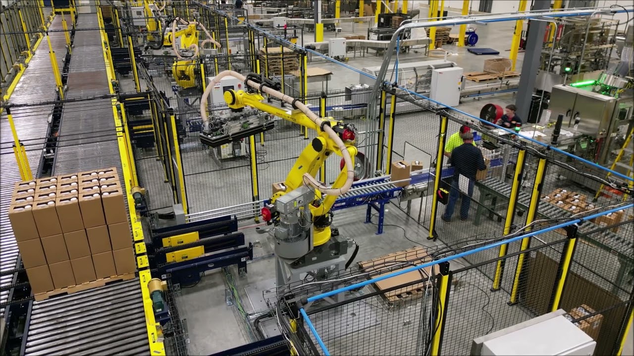 Automated Packaging line including Robotic depalletizing and robotic palletizing. Right Stuff Eqpt.