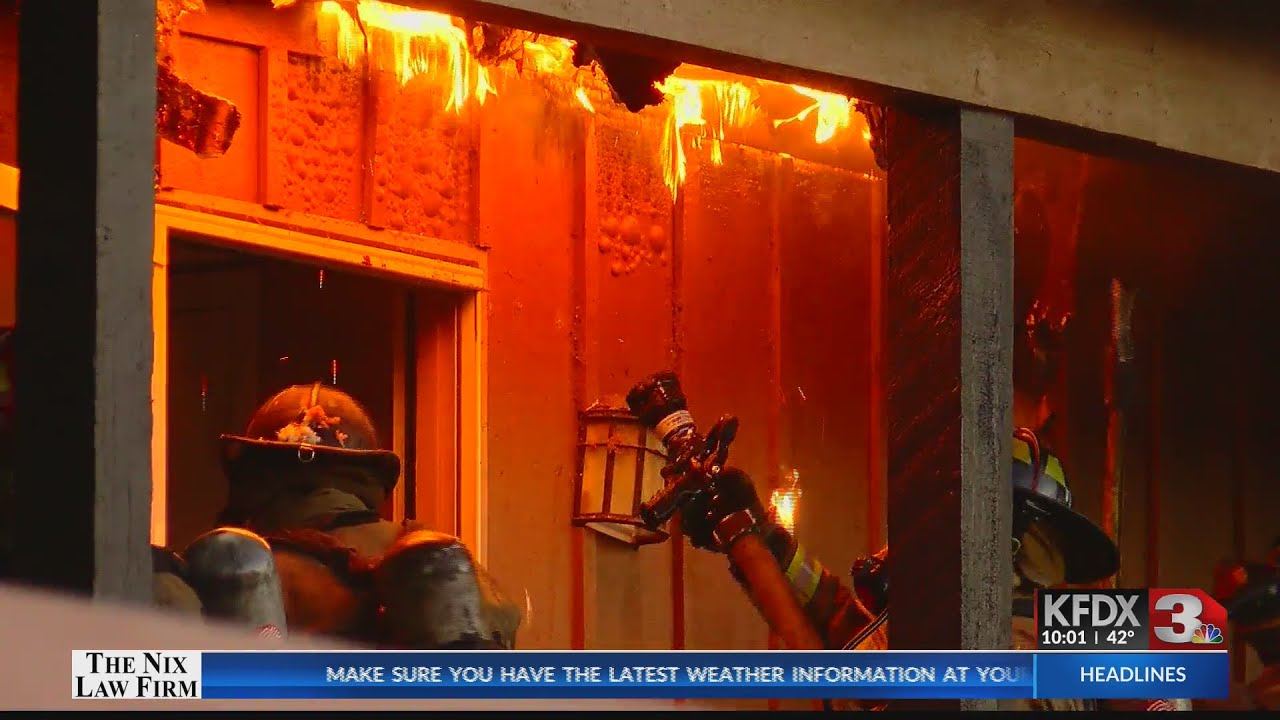 Firefighters responding to three-alarm fire at Woodlands Apartments