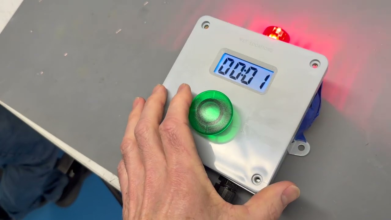 Digital timer with a long initial beep to announce coffee breaks at a factory
