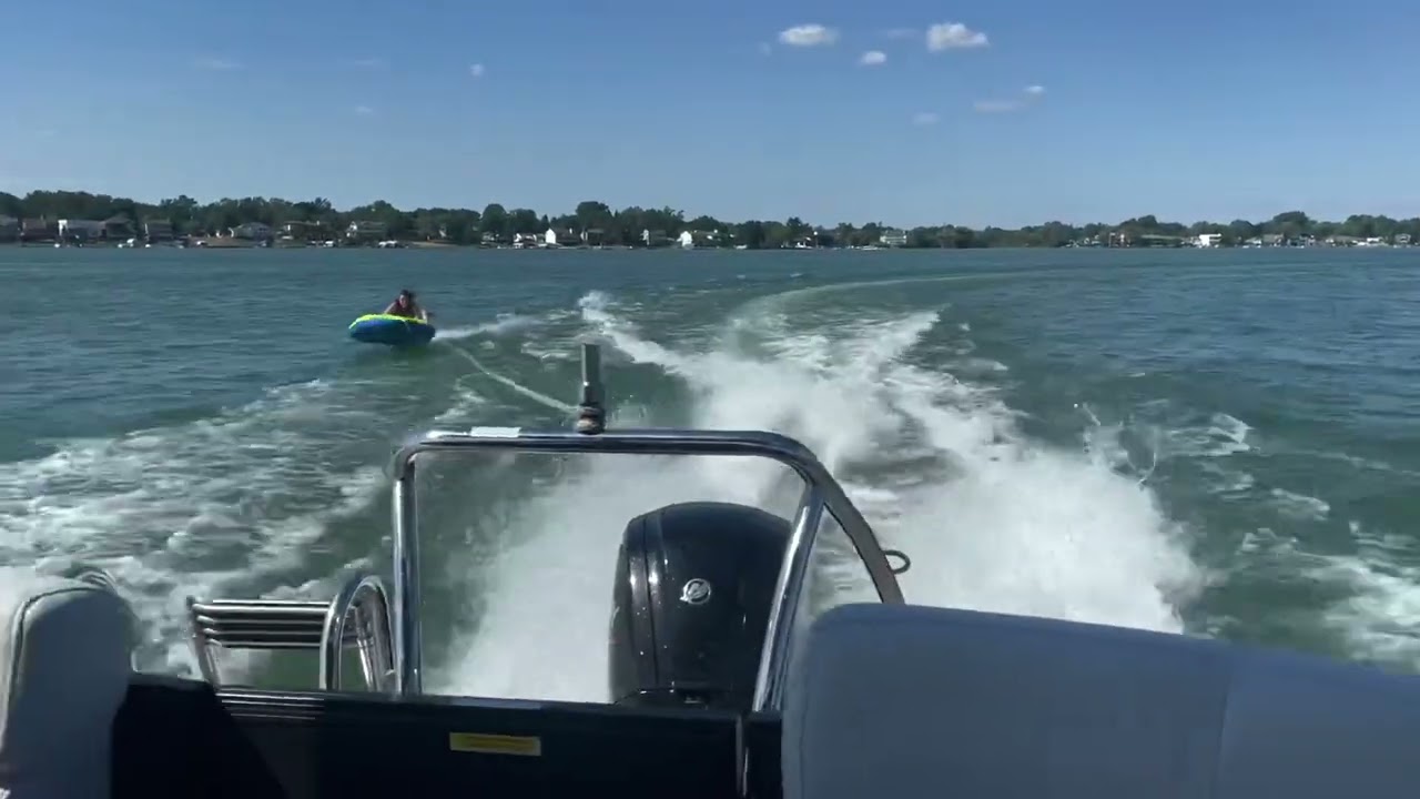 Pulling 2 tubes Behind 115hp Pontoon!