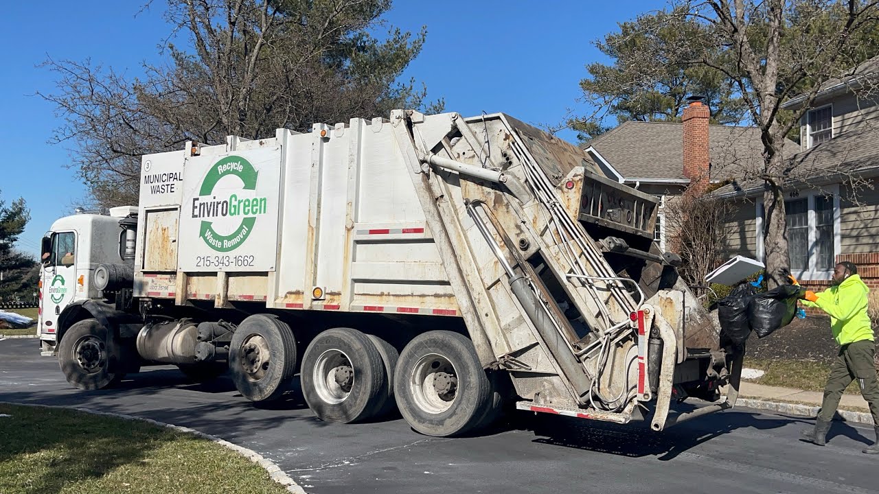 Envirogreen Peterbilt 320 Pak-Mor rear loader garbage truck