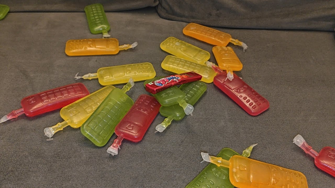 Some lot's of colourful mobile jelly and 1 boomer chewing gum 