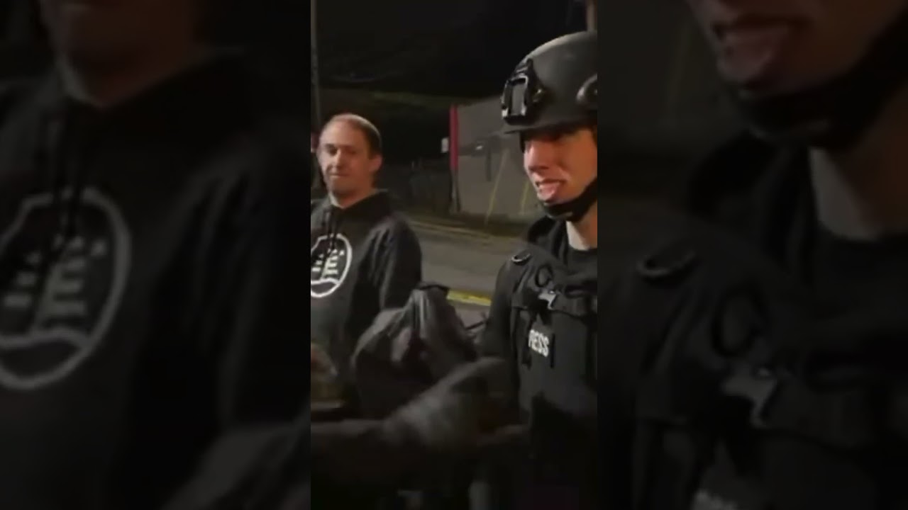 Antifa altercation with journalists, umbrella appears broken in Portland ICE protests