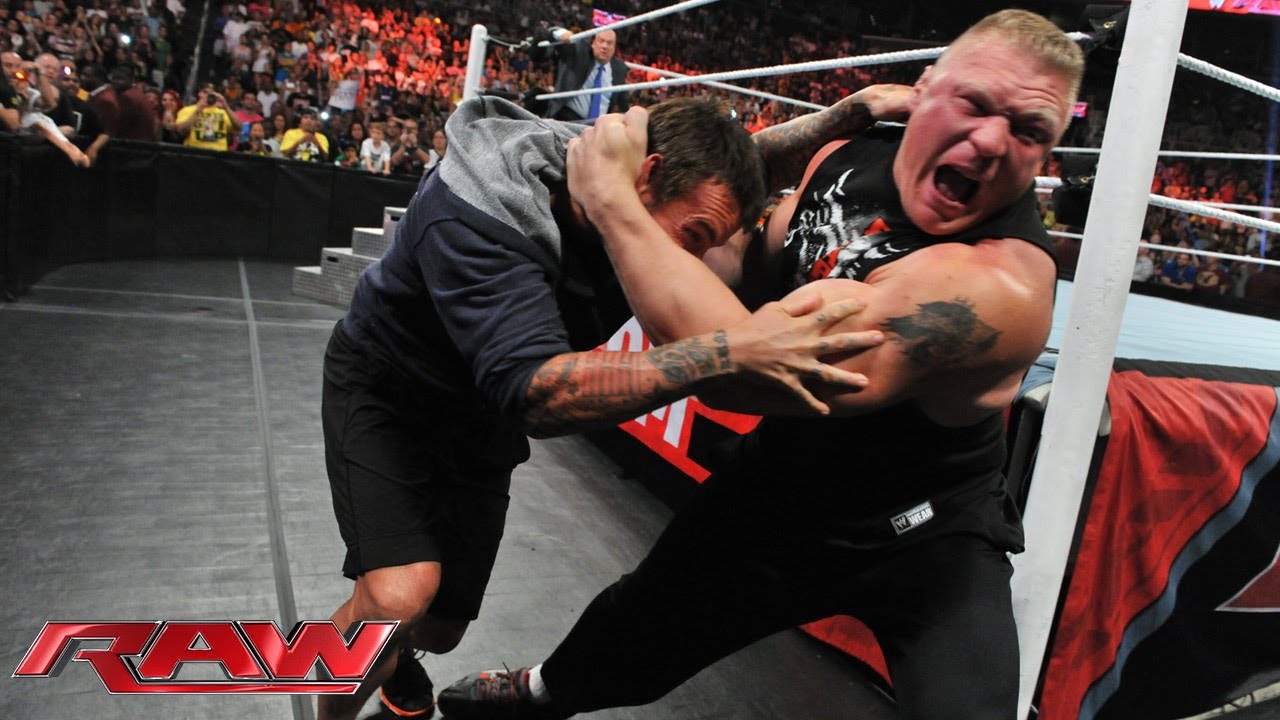 Брок Леснар атакует CM Punk: Raw, 15 июля 2013 г.
