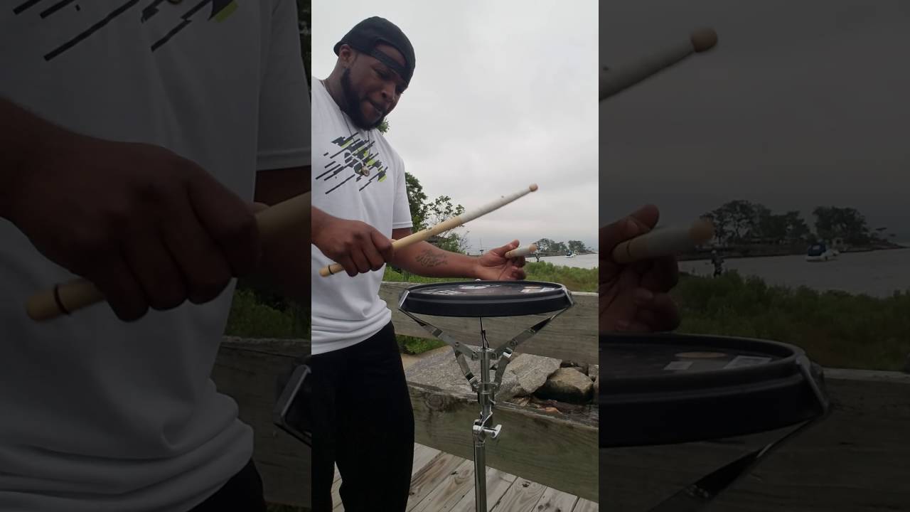 Tim Fountain in the park drumming