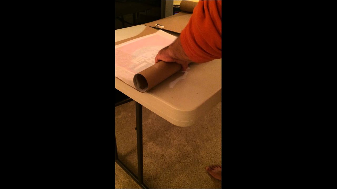 How to properly roll and package a poster for shipping.