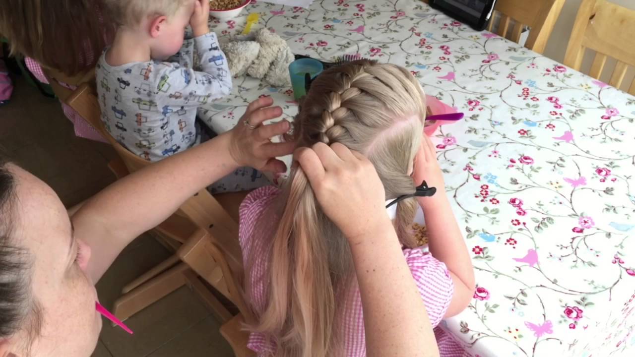 French braid bow by Two Little Girls Hairstyles