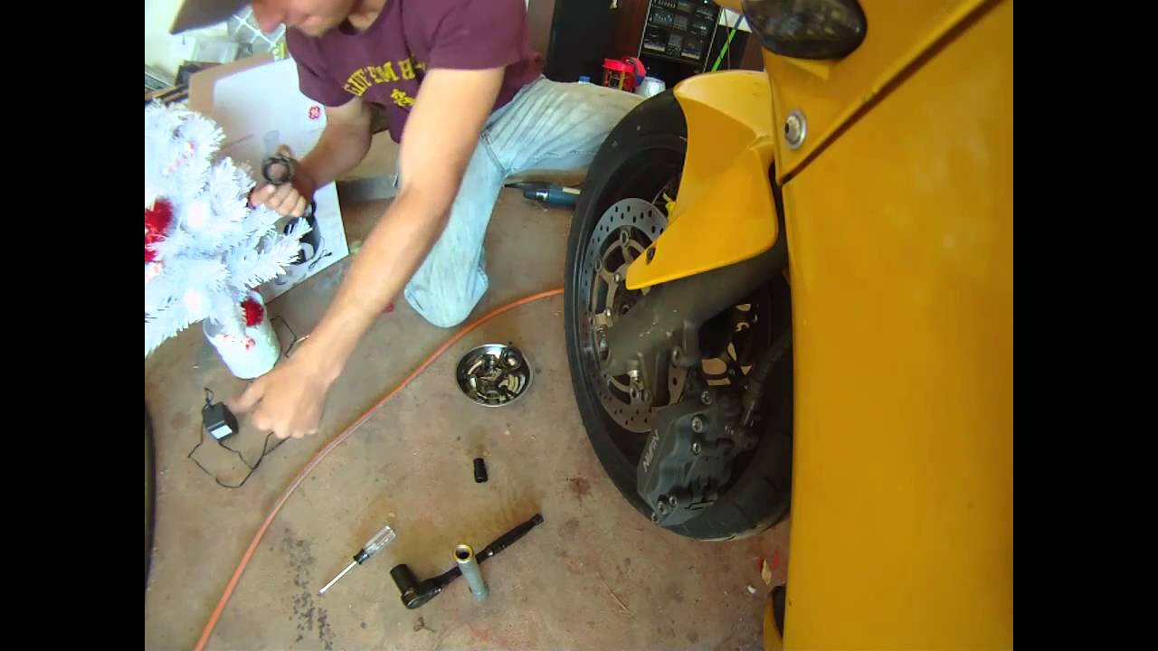 How to Remove Front Axle, Wheel and Bearings for Honda CBR F4i