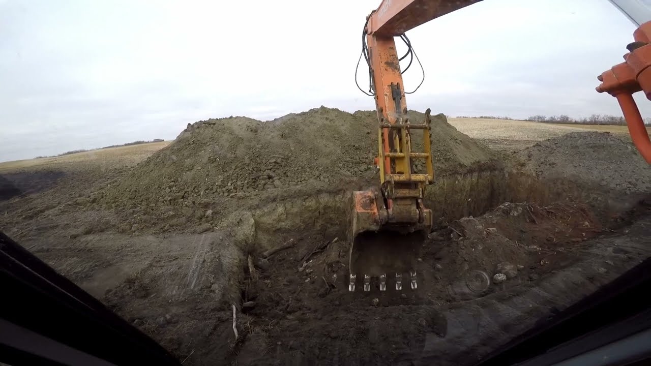 Covering up the rocks and burn piles
