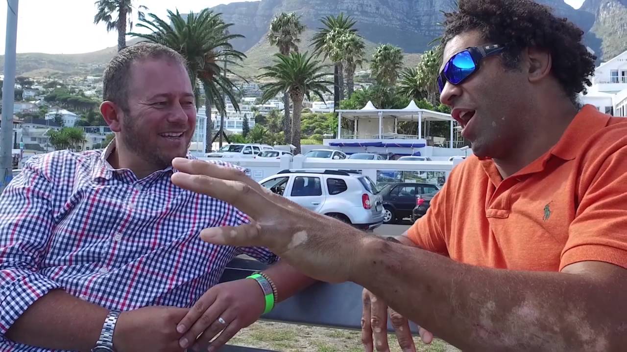 Dan Nicholl chats to Colin Charvis in Camps Bay