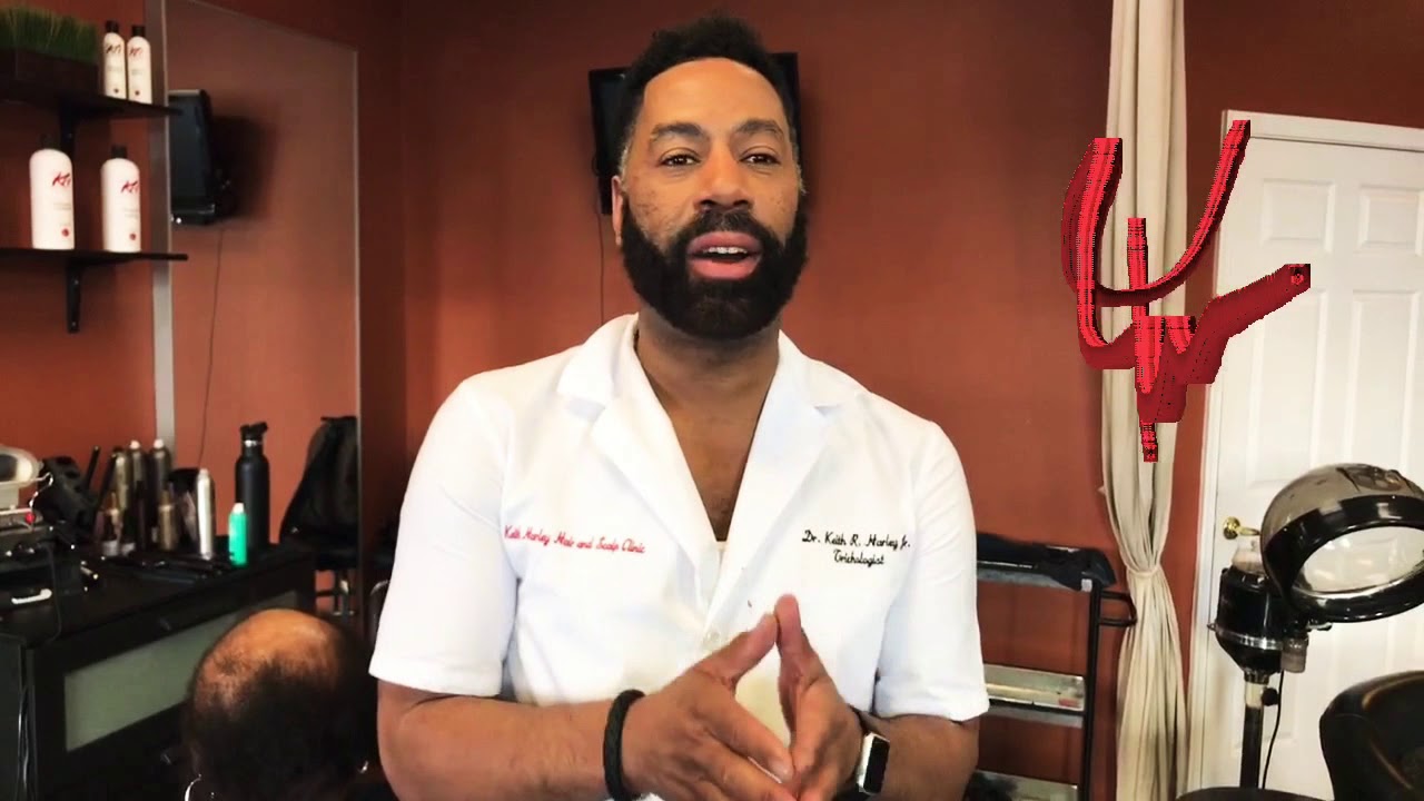 Dr. Keith Harley Trichologist, Hair and Scalp Specialist does a consultation on hairloss
